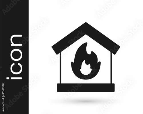 Black Fire in burning house icon isolated on white background. Vector