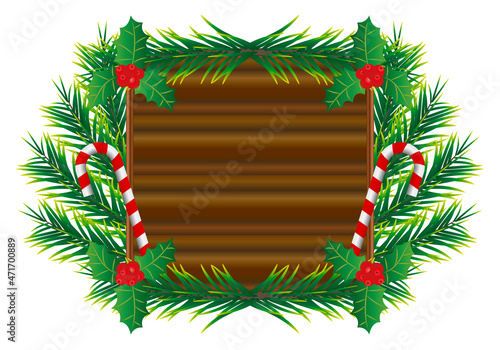 Felicitación de navidad con tabla de madera, bastón de caramelo, acebo, ramas de abeto.