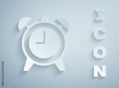Paper cut Alarm clock icon isolated on grey background. Wake up, get up concept. Time sign. Paper art style. Vector