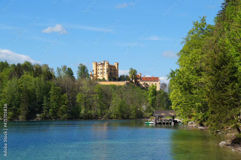 romantic medieval Wittelsbach Hohenschwangau Castle (Schloss Hohenschwangau) in the Alps on lake Alpsee (Allgau, Bavaria, Germany)	