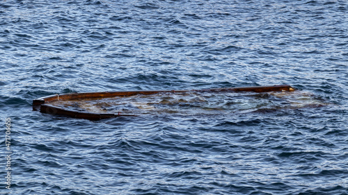 Photography A wooden boat sank. Collapse and problems concept.