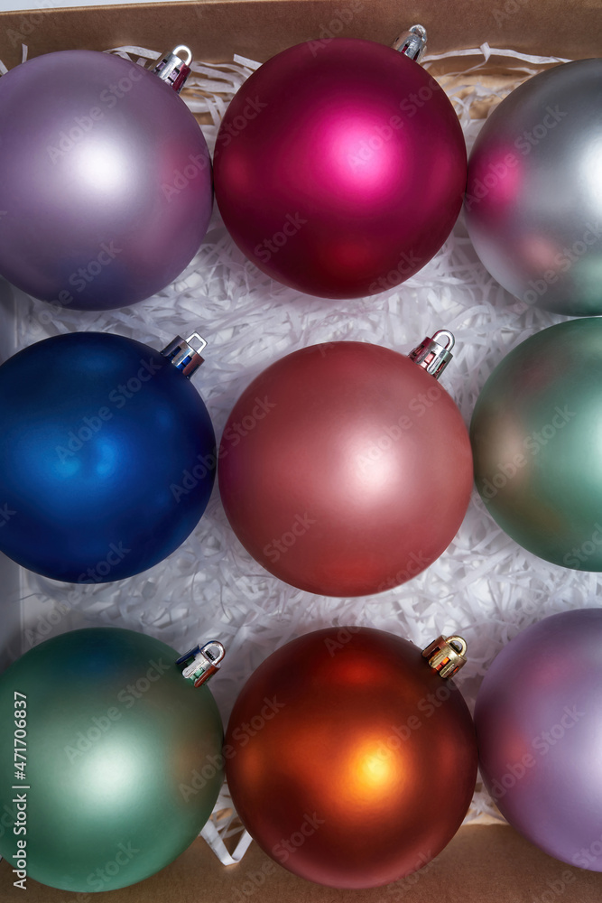 Cropped image of package with christmas balls Cropped image of package with christmas balls