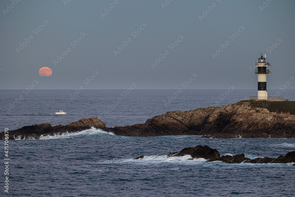 November Full Moon over the Illa Pancha lighthouse and hotel, in Ribadeo, Galicia, Spain!