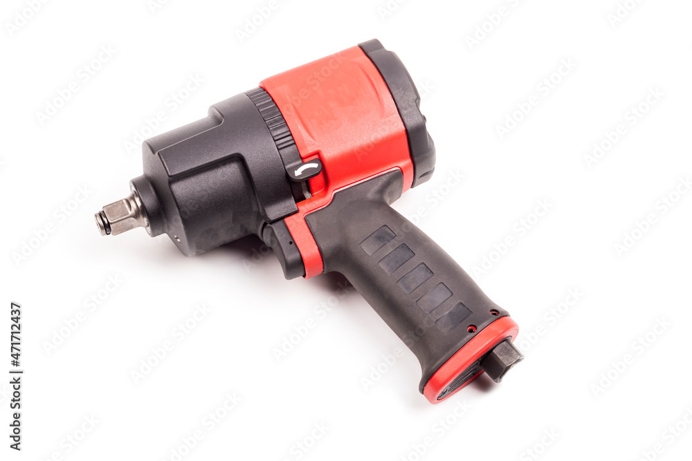 tools, impact pneumatics for unscrewing nuts in the car. on a white background. the color is red tools, impact pneumatics for unscrewing nuts in the car. on a white background. the color is red