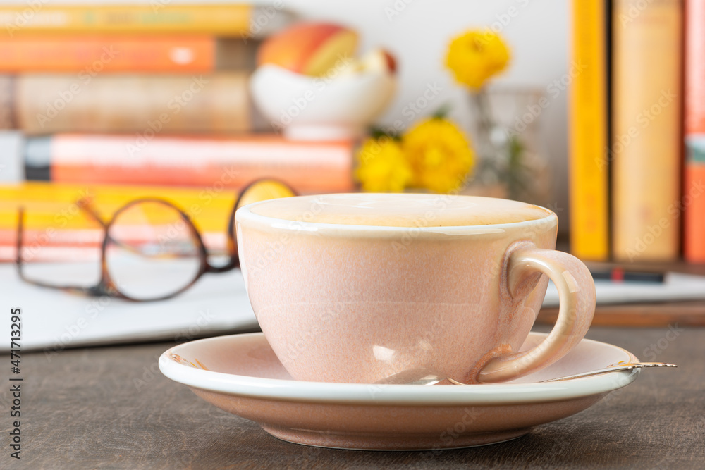 Cup of Coffee Cappuccino with Books and Eyeglasses Working or Studing Morning Cup of Coffee Cappuccino with Books and Eyeglasses Working or Studing Morning