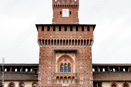 Square brick tower of Castello Sforzesco. Milan, Italy photo