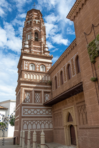 Tower of the church of Santa María de Utebo, Mudejar style, in Zaragoza, Poble Espanyol, Spanish Village in Barcelona, Catalonia, Spain. photo