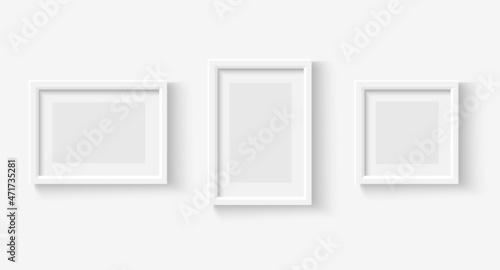Photo frames on wall. White picture frame set. Vector empty realistic gallery