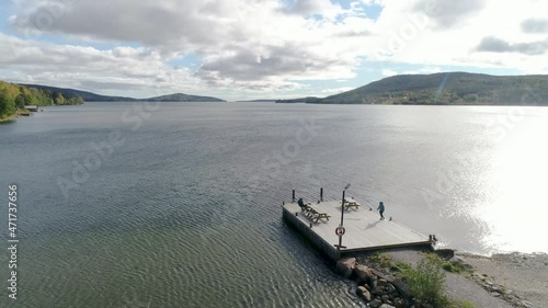 50fps aerial view of mountain and the sea at skuleberget campsite caravan camping in Hoga Kusten Sweden photo