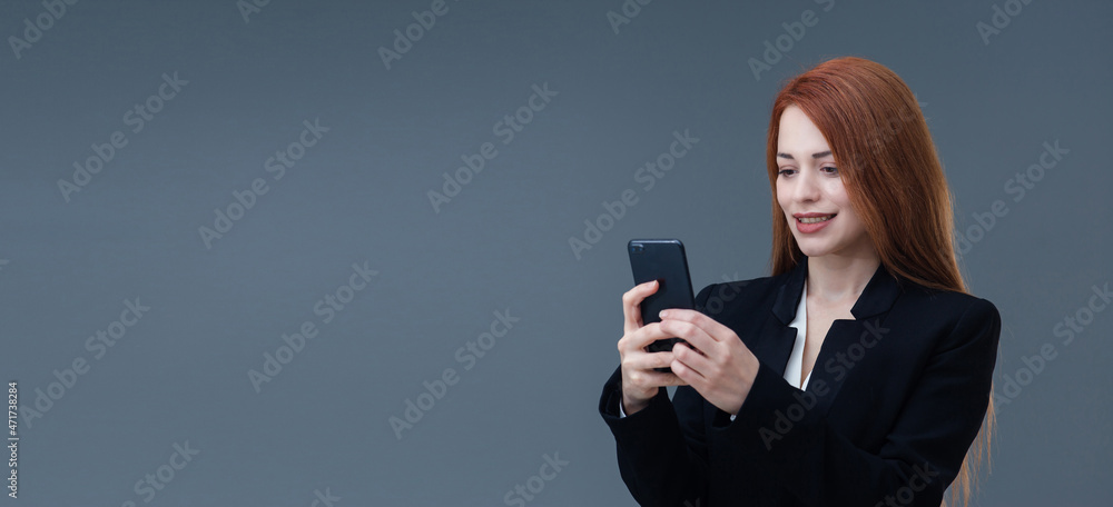 Beautiful smiling Turkish young woman, mobile phone concept. She is checking her mobile phone. Beautiful smiling Turkish young woman, mobile phone concept. She is checking her mobile phone.