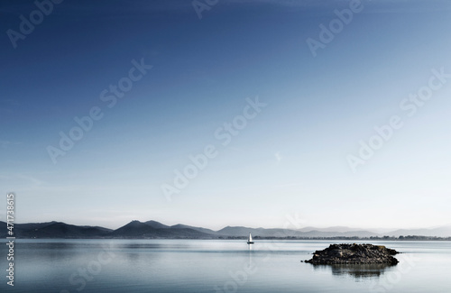 Sail boat on the waters of Lake Trasimeno , Italy © vittoria