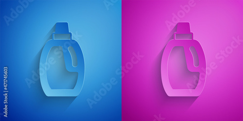 Paper cut Plastic bottle for laundry detergent, bleach, dishwashing liquid or another cleaning agent icon isolated on blue and purple background. Paper art style. Vector