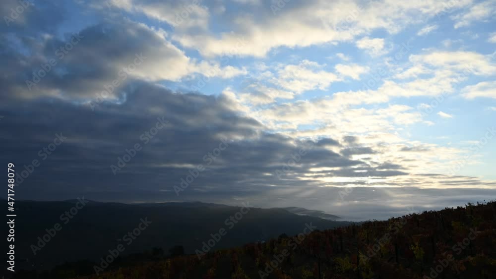 Timelapse flying clouds above vineyards in Douro valley, autumn colors, Portugal Timelapse flying clouds above vineyards in Douro valley, autumn colors, Portugal