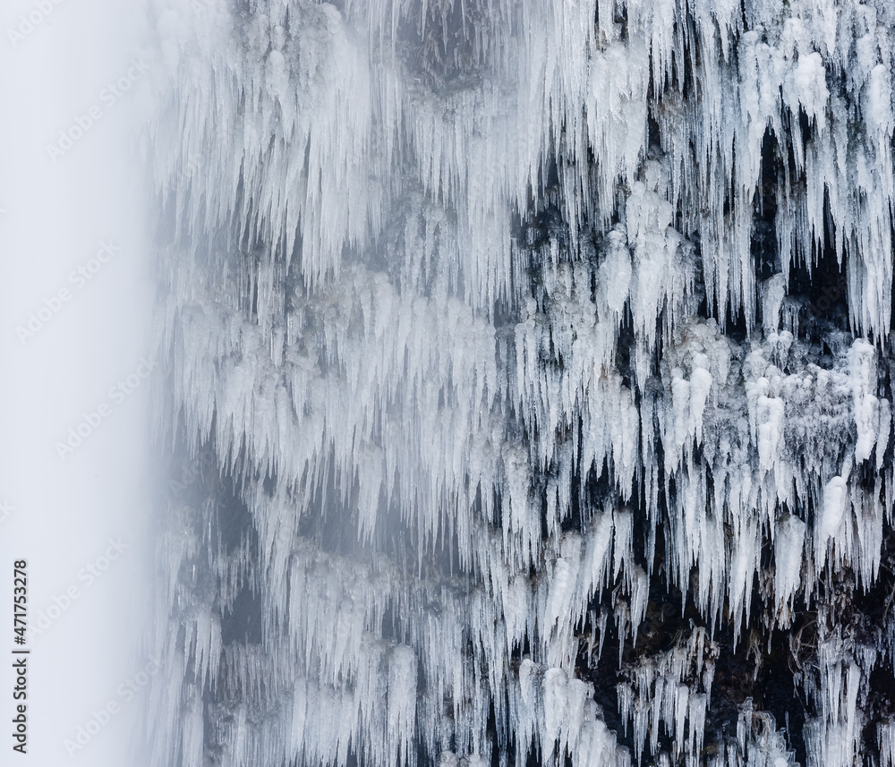 Fototapeta premium waterfall in winter with frozen ice 