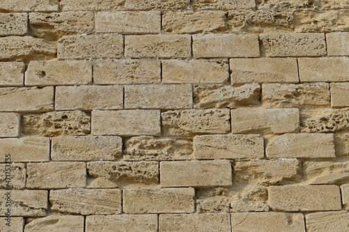 Fotografie Muratura portante in tufo di una struttura antica