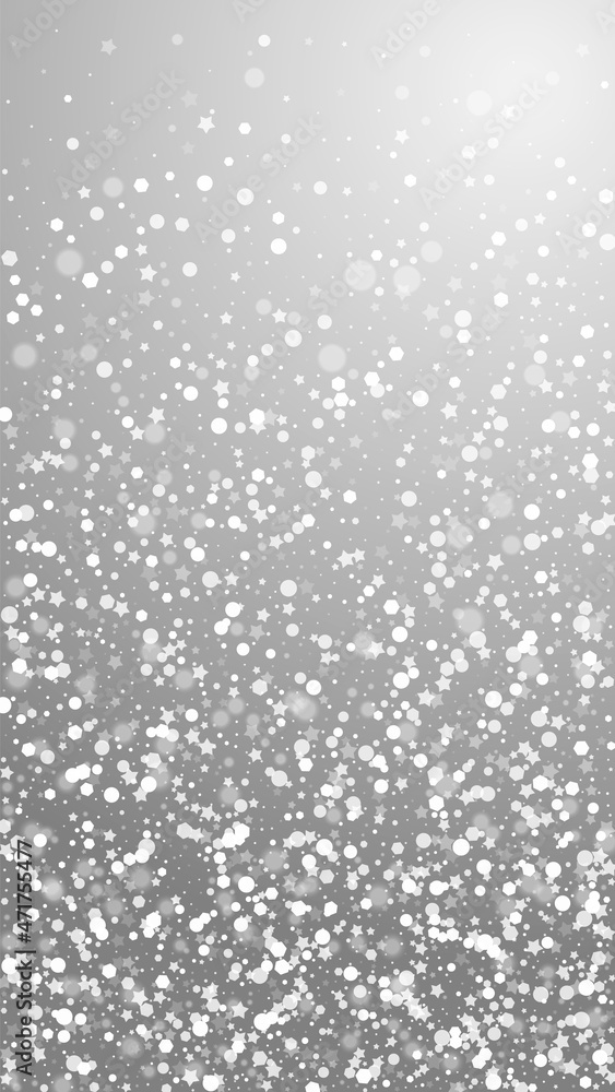Magic stars Christmas background. Subtle flying snow flakes and stars on grey background. Appealing winter silver snowflake overlay template. Classy vertical illustration.
