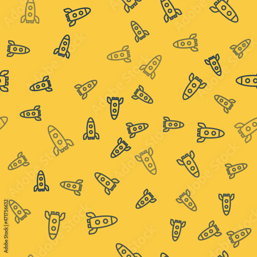Blue line Rocket ship icon isolated seamless pattern on yellow background. Space travel. Vector