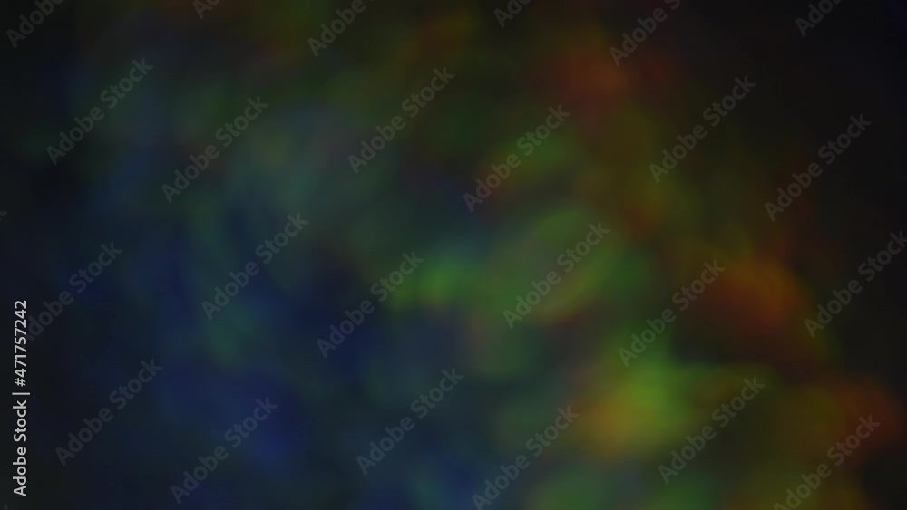 Gradient overflow motion of iridescent bokeh. Round smoky bokeh in rainbow colors moving slowly from left to right as an abstract background. Can be used as a backdrop or overlay Gradient overflow motion of iridescent bokeh. Round smoky bokeh in rainbow colors moving slowly from left to right as an abstract background. Can be used as a backdrop or overlay