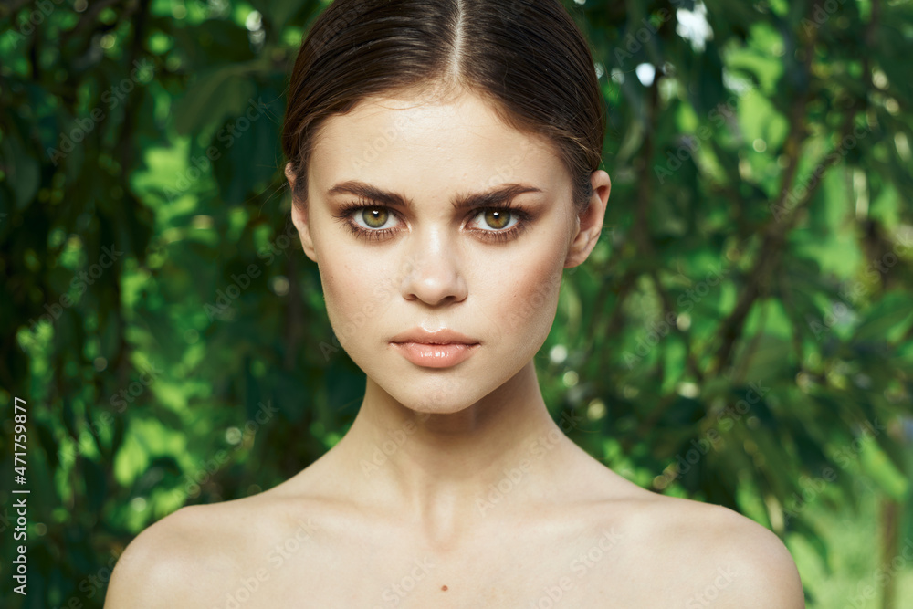 beautiful woman Cosmetology nature green leaves glamor close-up beautiful woman Cosmetology nature green leaves glamor close-up