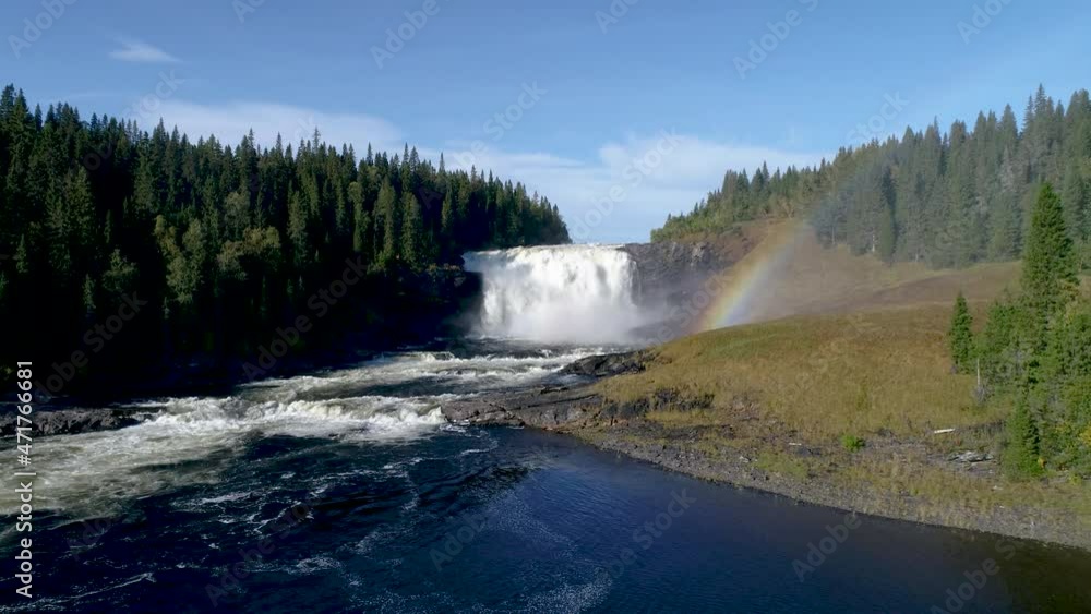 50fps aerial drone Summer famous waterfall Tannforsen northern Sweden rainbows in the mist rapid flowing cascades water 50fps aerial drone Summer famous waterfall Tannforsen northern Sweden rainbows in the mist rapid flowing cascades water