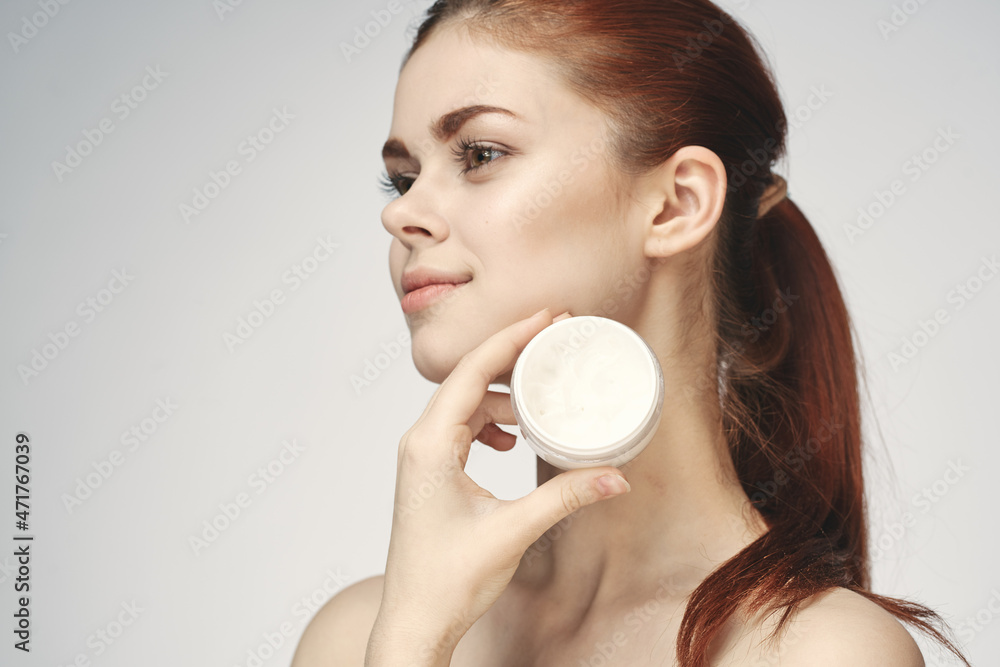 woman with jar of cream makeup face skin care close-up woman with jar of cream makeup face skin care close-up