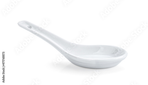 ceramic spoon isolated on white background photo