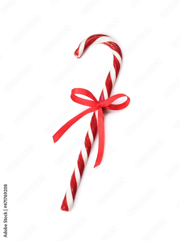 Delicious Christmas candy cane with red bow isolated on white, top view Delicious Christmas candy cane with red bow isolated on white, top view