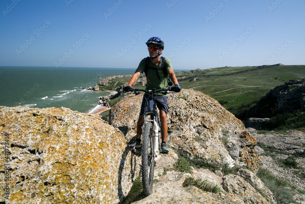 A cyclist on the mountain trails of the Crimea.