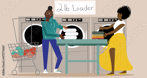 Lesbian couple doing laundry
