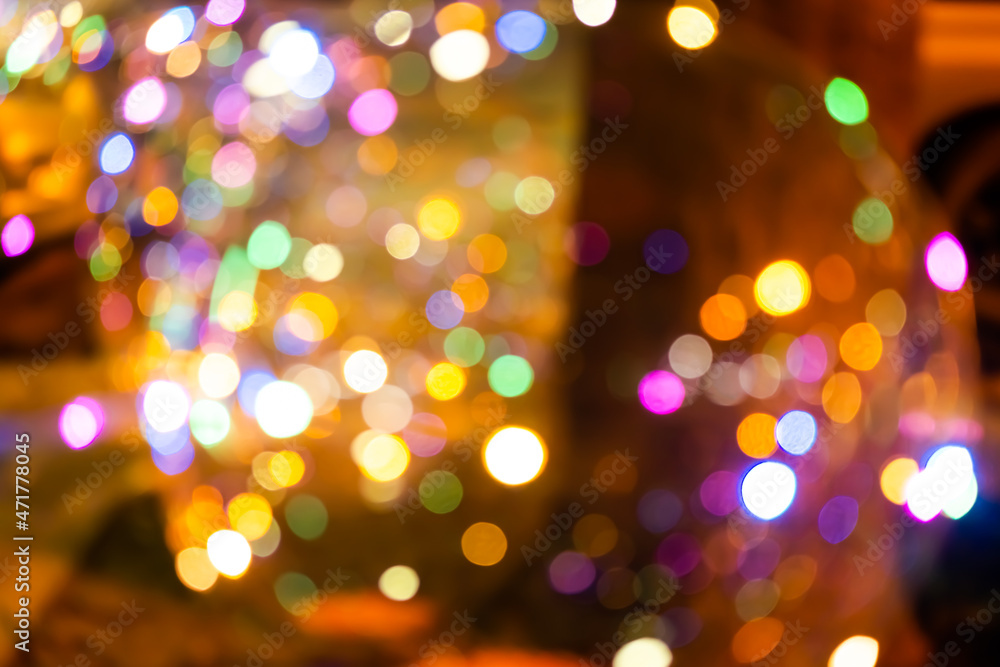 Obraz premium colorful bokeh background happy new year 2022. abstract effect light night out of focus circle wallpaper. for christmas party celebration holidays or technology background concept.