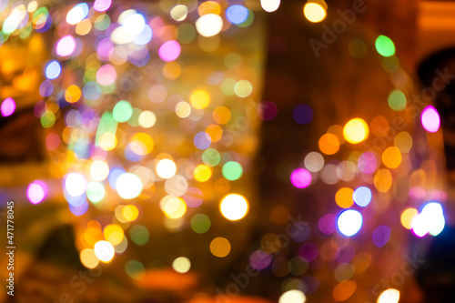 colorful bokeh background happy new year 2022. abstract effect light night out of focus circle wallpaper. for christmas party celebration holidays or technology background concept.
