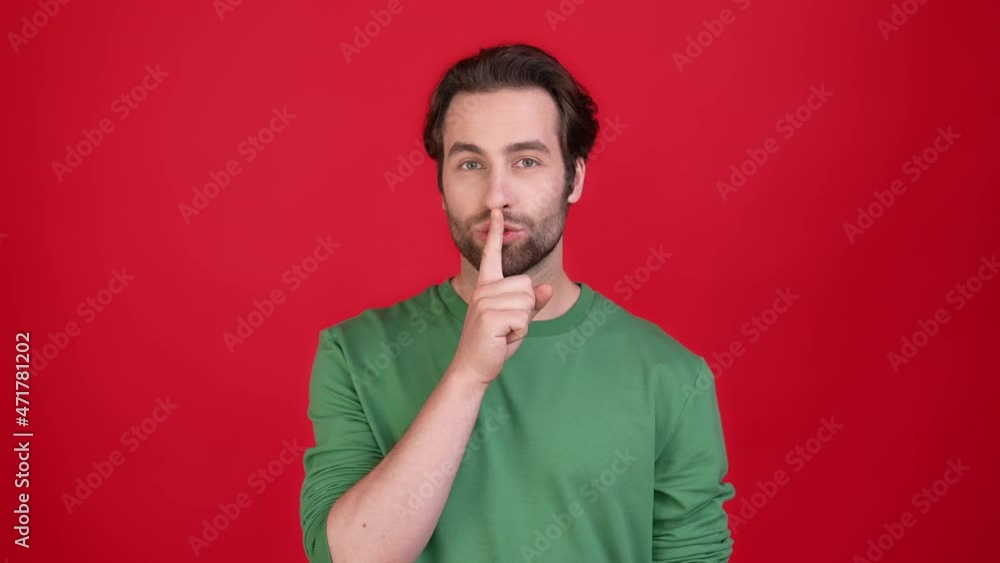 Suspicious guy hand mouth no say message isolated bright color background Suspicious guy hand mouth no say message isolated bright color background