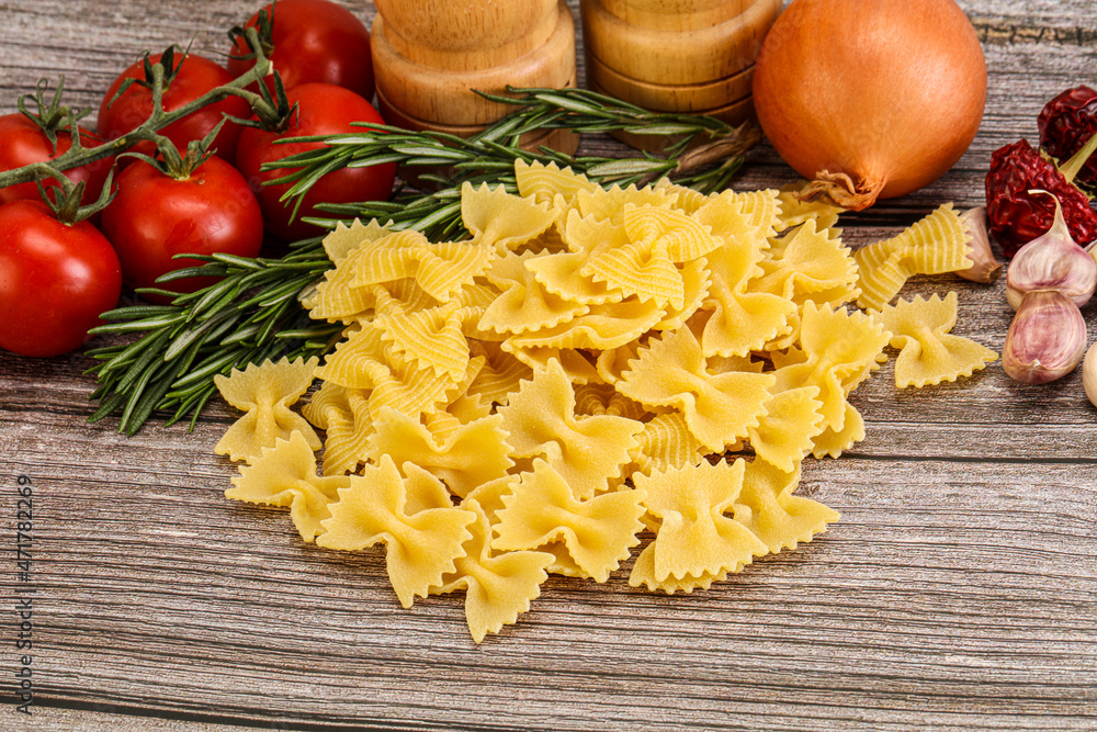 Raw Italian farfalle pasta for cooking Raw Italian farfalle pasta for cooking