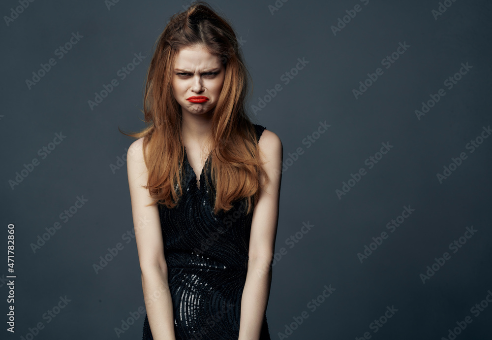 beautiful woman Red hair charm posing cosmetics dark background beautiful woman Red hair charm posing cosmetics dark background