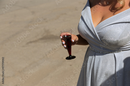 woman with a glass of champagne