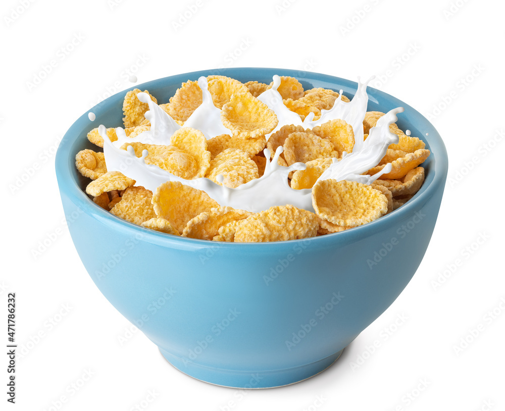 cornflakes with splashing milk in blue bowl cornflakes with splashing milk in blue bowl