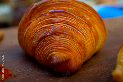 french traditiona croissant brioche butter bread  on wood photo