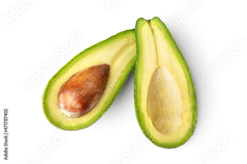 Two halves of avocado on a white background.  Top view.