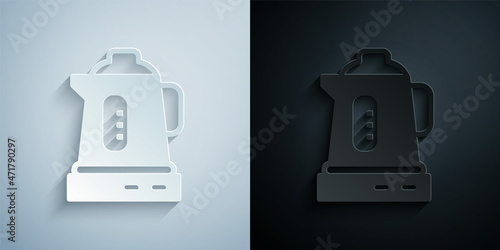 Paper cut Electric kettle icon isolated on grey and black background. Teapot icon. Paper art style. Vector