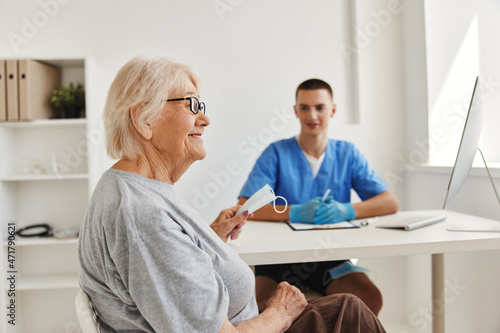 elderly patient talking to the doctor health care