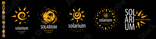 A set of vector logos Solarium on a black background photo