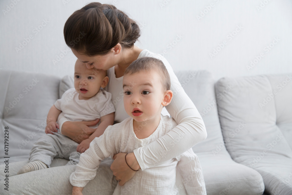 mom plays and reads books with two little kids. mother spends time with two child sons at home. place for text. copy space. family time at home
mom plays and reads books with two little kids. mother spends time with two child sons at home. place for text. copy space. family time at home