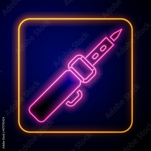 Glowing neon Soldering iron icon isolated on black background. Vector