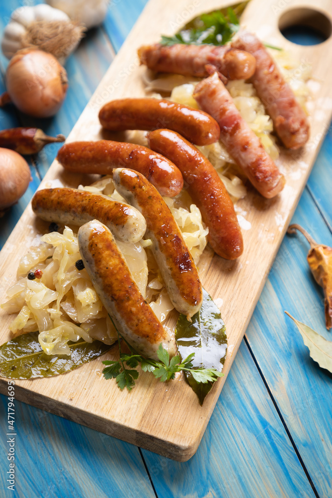 Grilled german sausage links with sauerkraut Grilled german sausage links with sauerkraut
