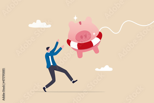 Emergency fund or money to help in crisis situation, savings for unexpected expense or losing job, emergency loan concept, happy businessman catching piggybank with lifebuoy as life support in crisis.