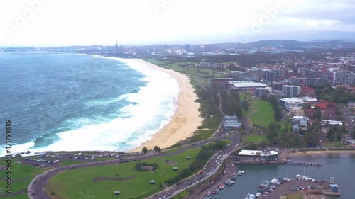 Wallpaper Mural Aerial drone view of Wollongong City Beach on the New South Wales South Coast, Australia, looking south to Port Kembla on a cloudy morning    Torontodigital.ca