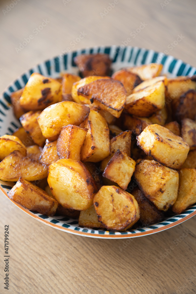 Roasted potatoes served in bowl Roasted potatoes served in bowl