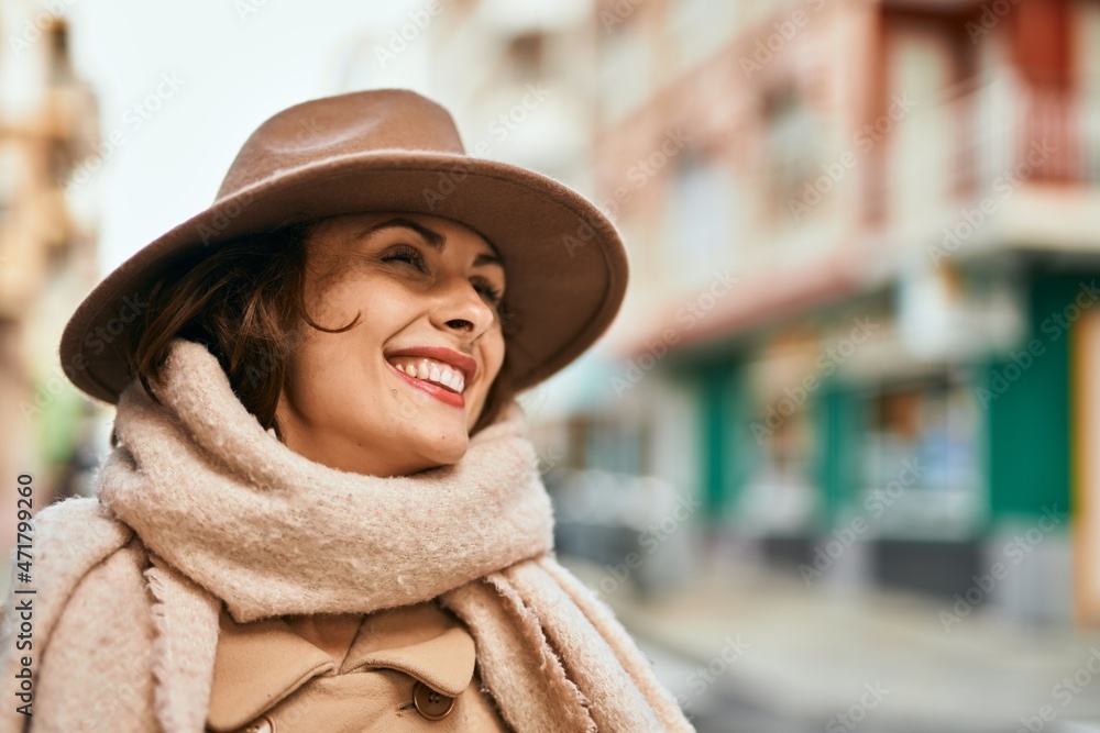Young hispanic woman wearing elegant style standing at the city. Young hispanic woman wearing elegant style standing at the city.