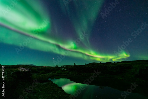 Aurora borealis lights and lake reflections © F.C.G.