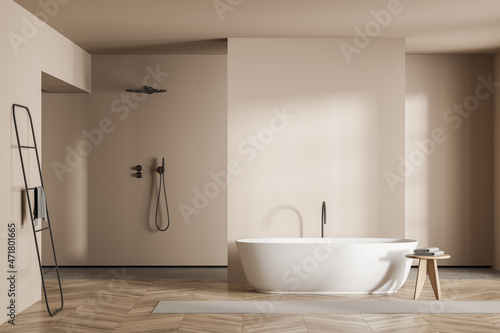 Minimalist beige bathroom with open concept shower